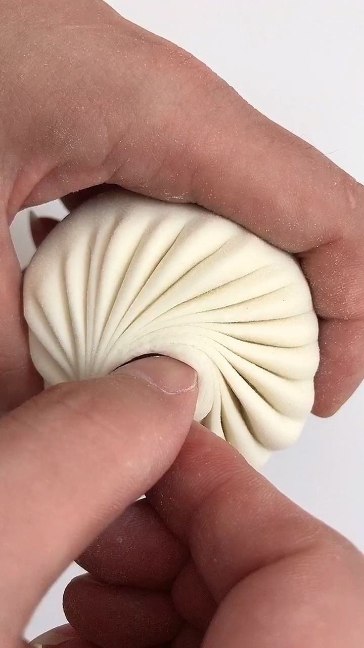 慢动作包包子手法
