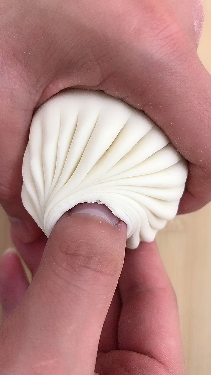 慢动作包包子手法
