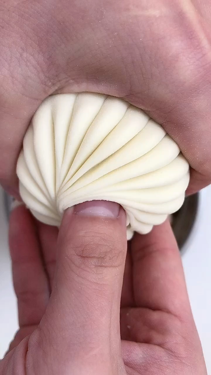 慢动作包包子手法