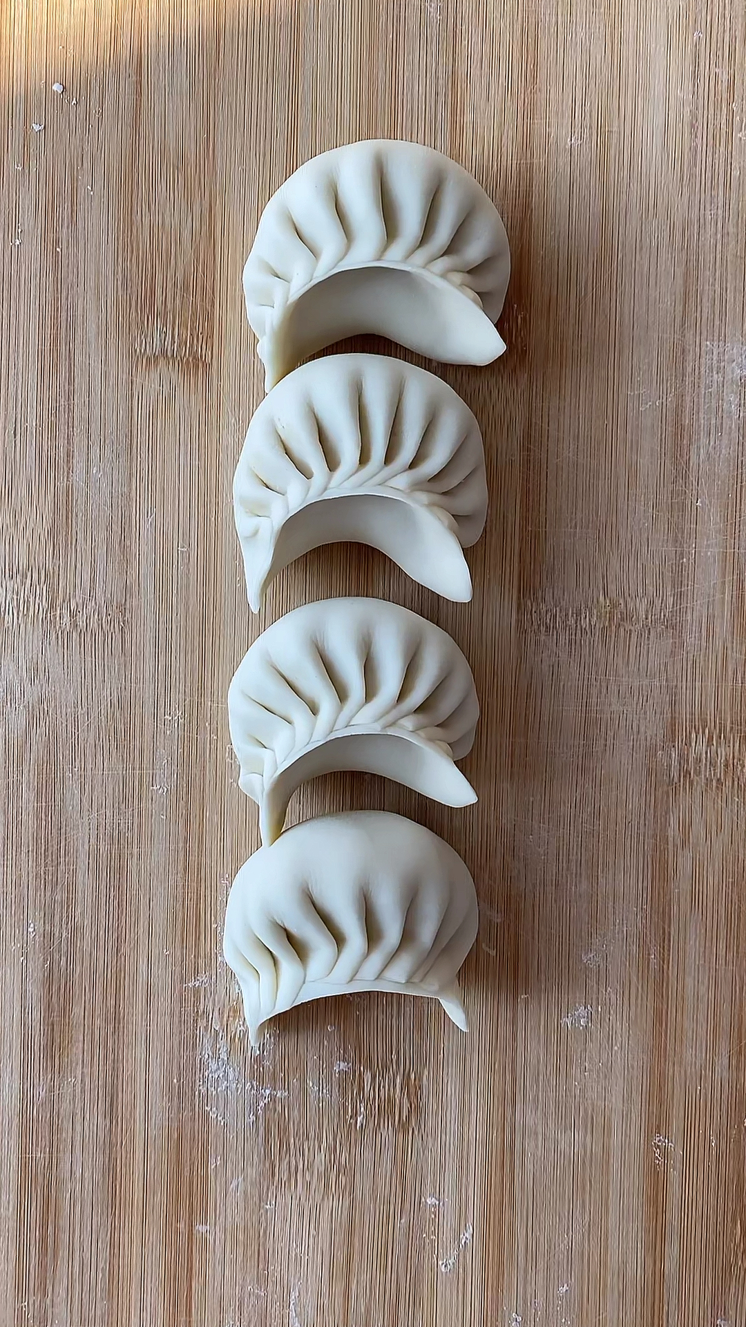 月牙形饺子包法图片