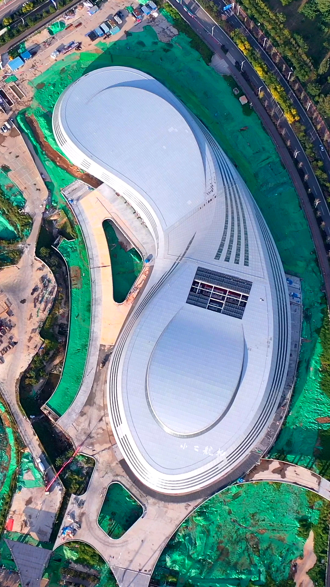 河北唐山建设中的奥体中心,设计师的灵感来自哪里,高空俯瞰像什么呢!