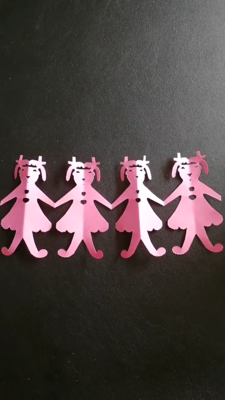 剪纸#手工剪纸小女孩手拉手,关注我,关注全民小视频.