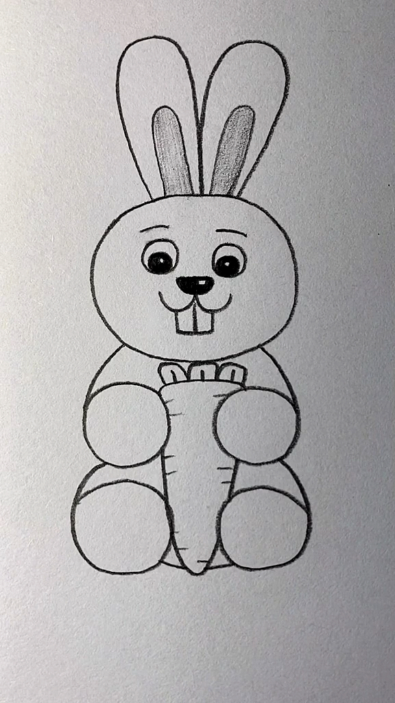 兔子抱萝卜的简笔画图片