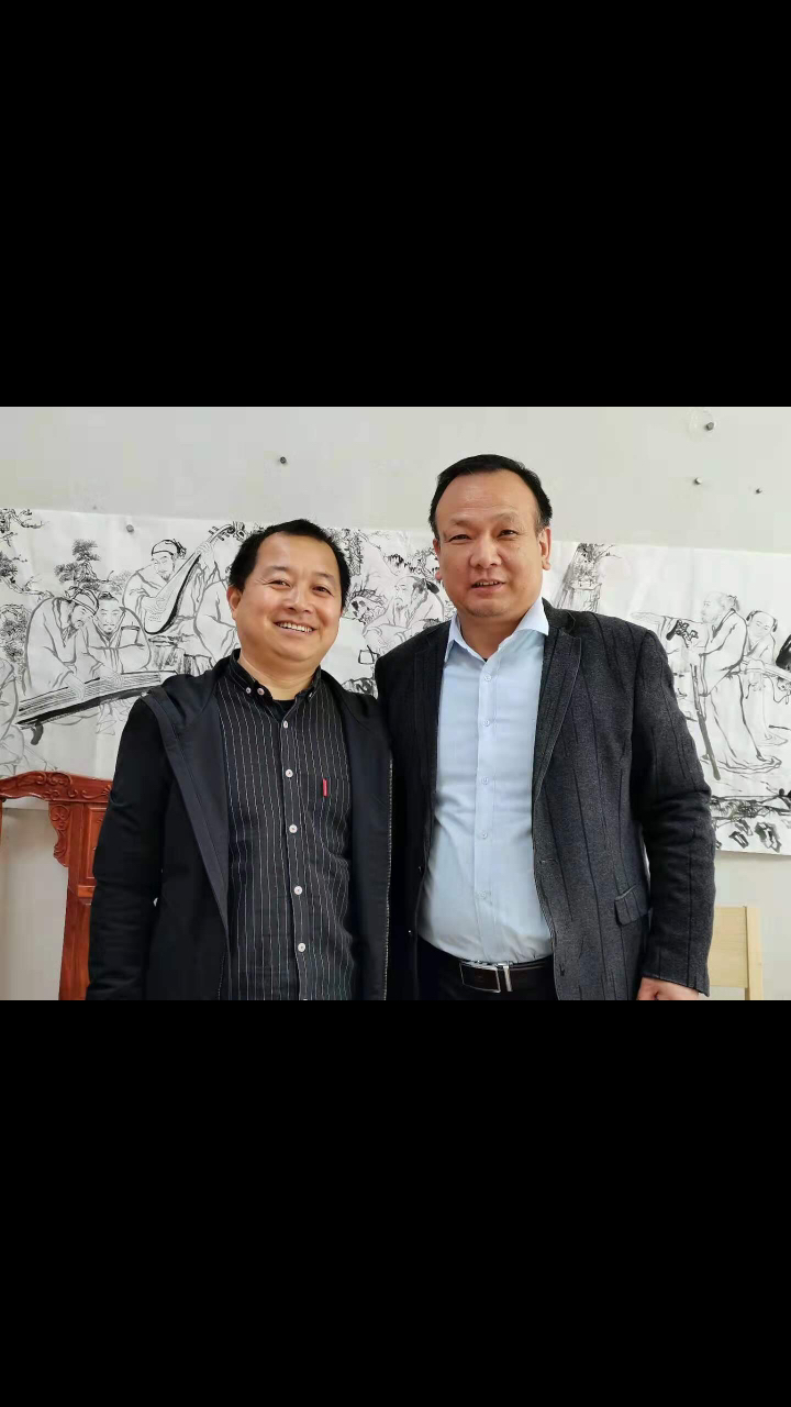 中广资讯总监魏天红和西安美院恩师郑安平合影