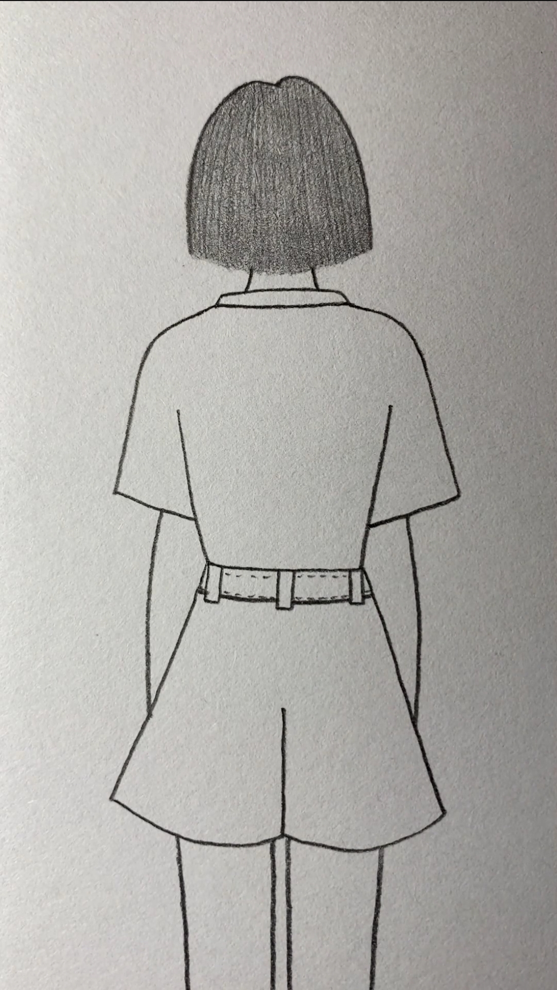 画孤单的短发女孩背影