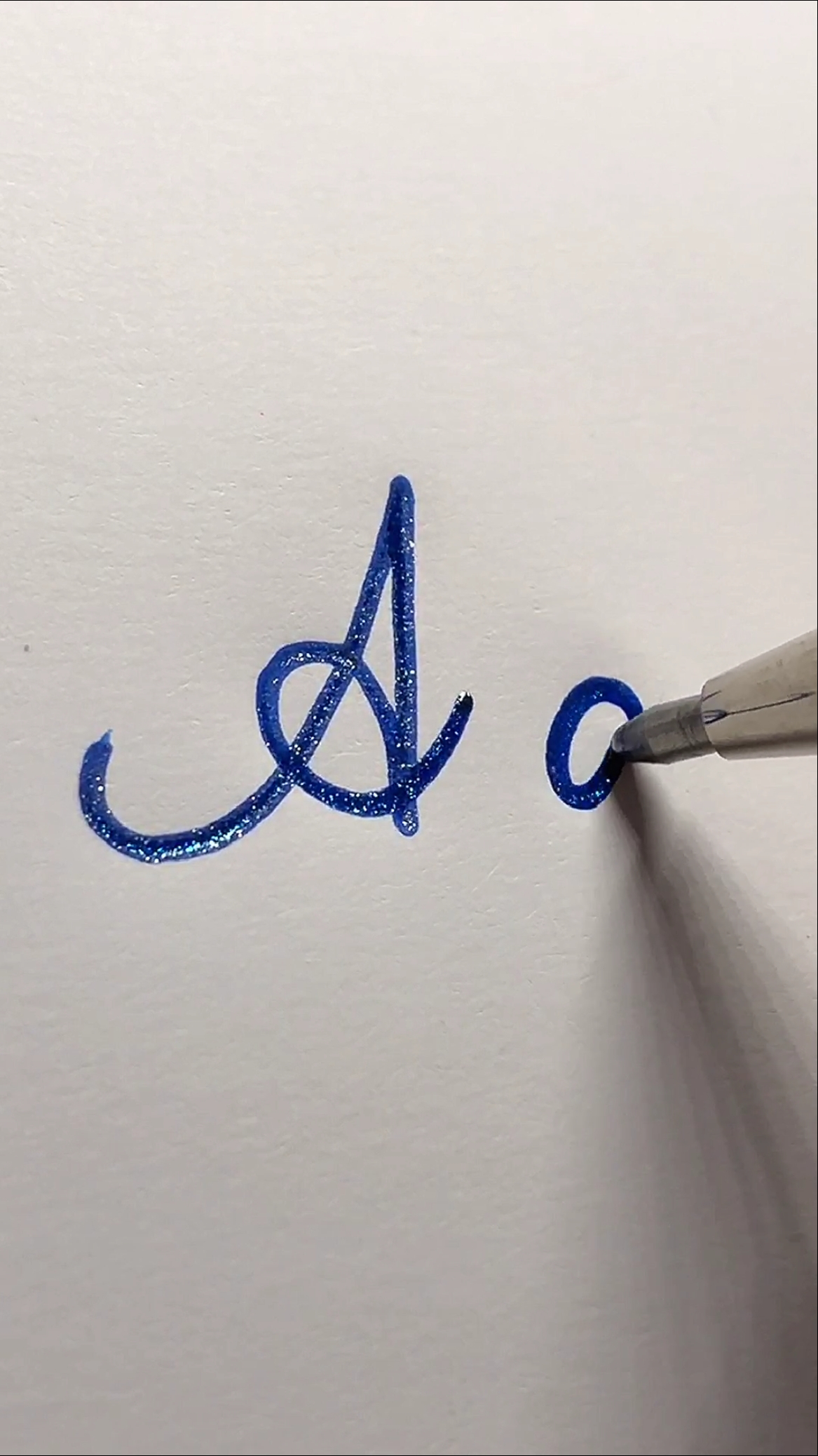 手写文字#来看看字母a的花体写法-度小视