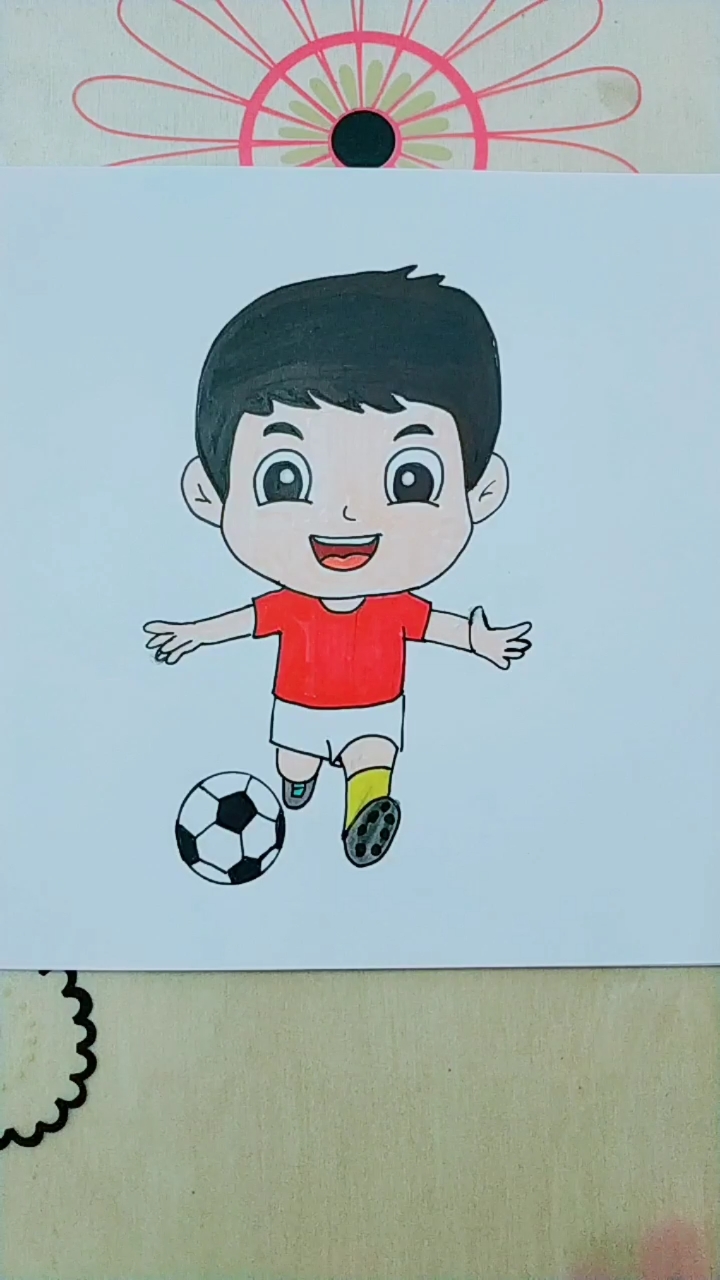 踢足球简笔画男孩彩色图片