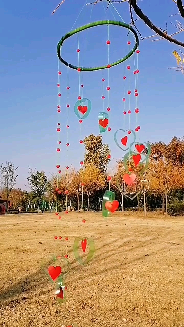 废物利用雪碧瓶做的风铃太美了