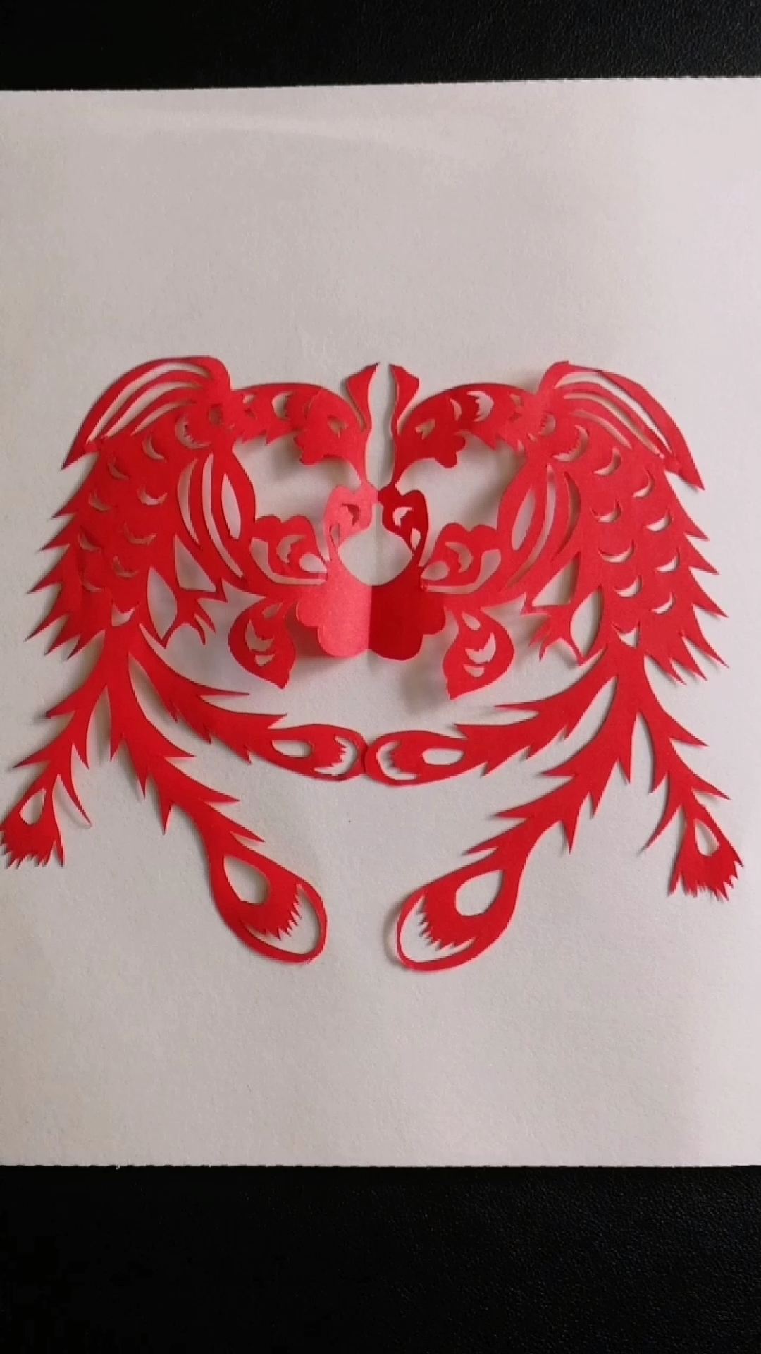 剪纸#手工剪纸凤凰,寓意婚姻美满,夫妻和谐.